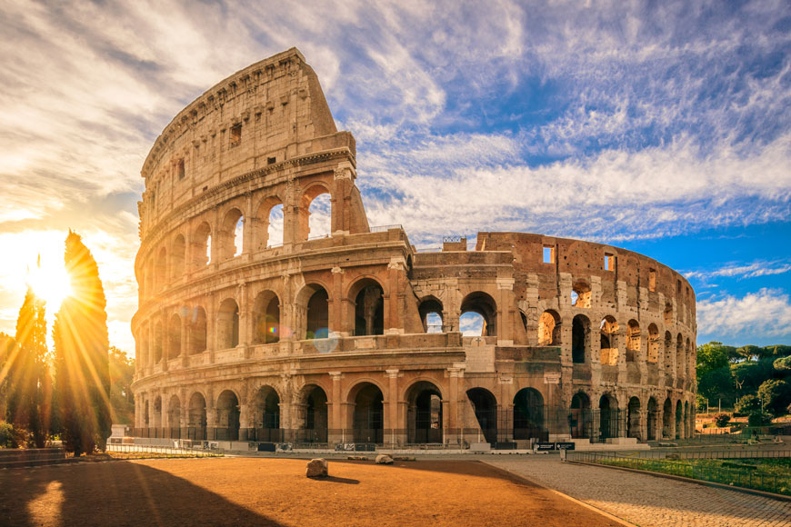 The restored Roman Colosseum at sunrise